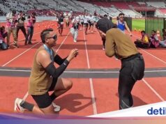 Romântico! Mulher viral pede namorado em casamento após completar a Maratona 42K Jakim 2026