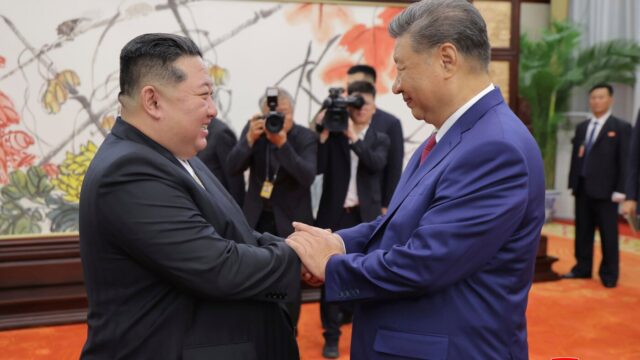 Xi-e-Kim-expressaram-esperanca-de-lacos-mais-estreitos-entre.com2F3c2Fa22F245d03ee4576ba06b6919bbaa5972Fap26158.jpeg